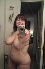 Naked BBW Holding A Big Tit In A Selfie